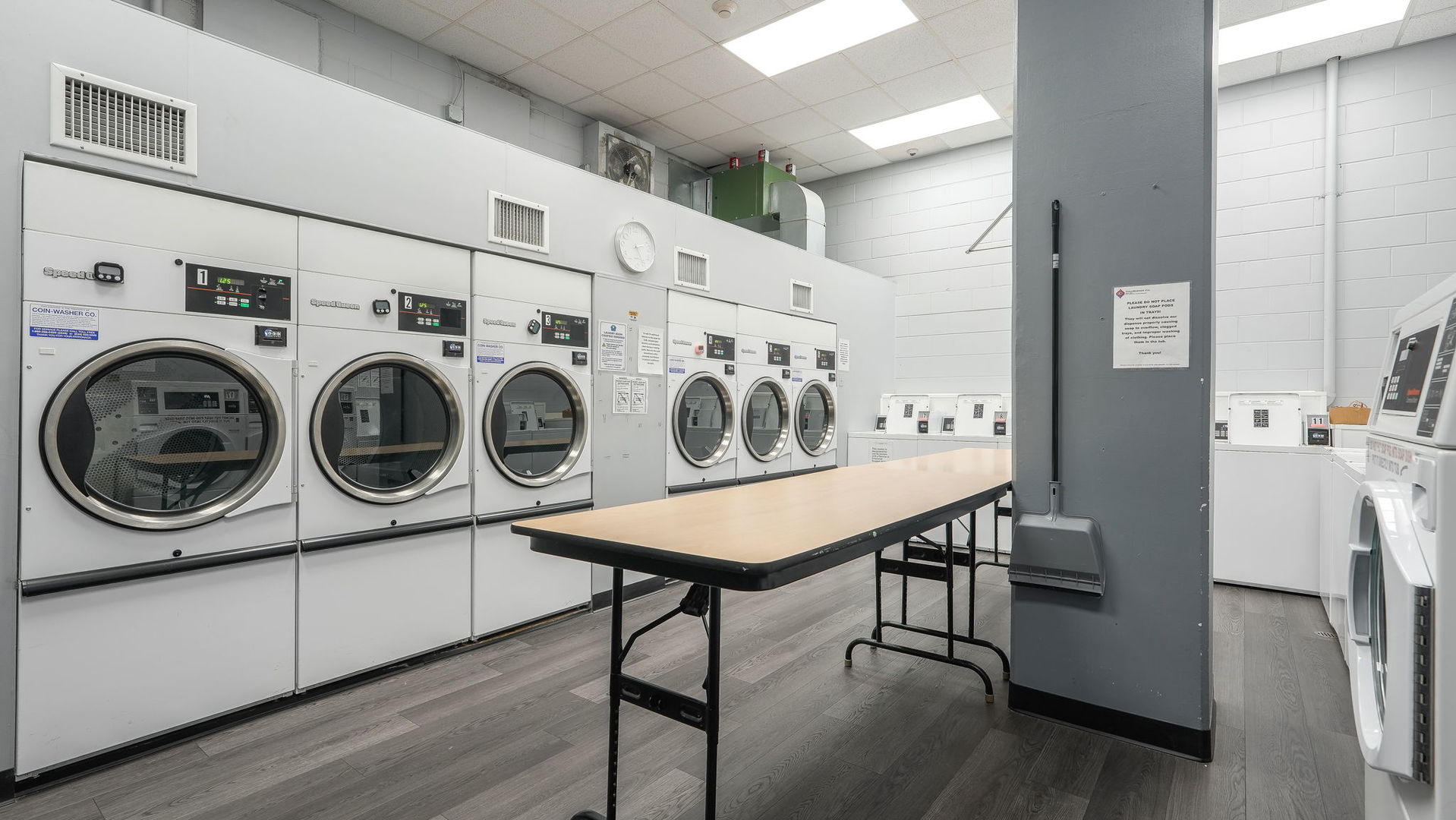 40 North Tower Road, Unit 4M Oak Brook, IL 60523 - Photo 8 of 17 a utility room with sink dryer and washer