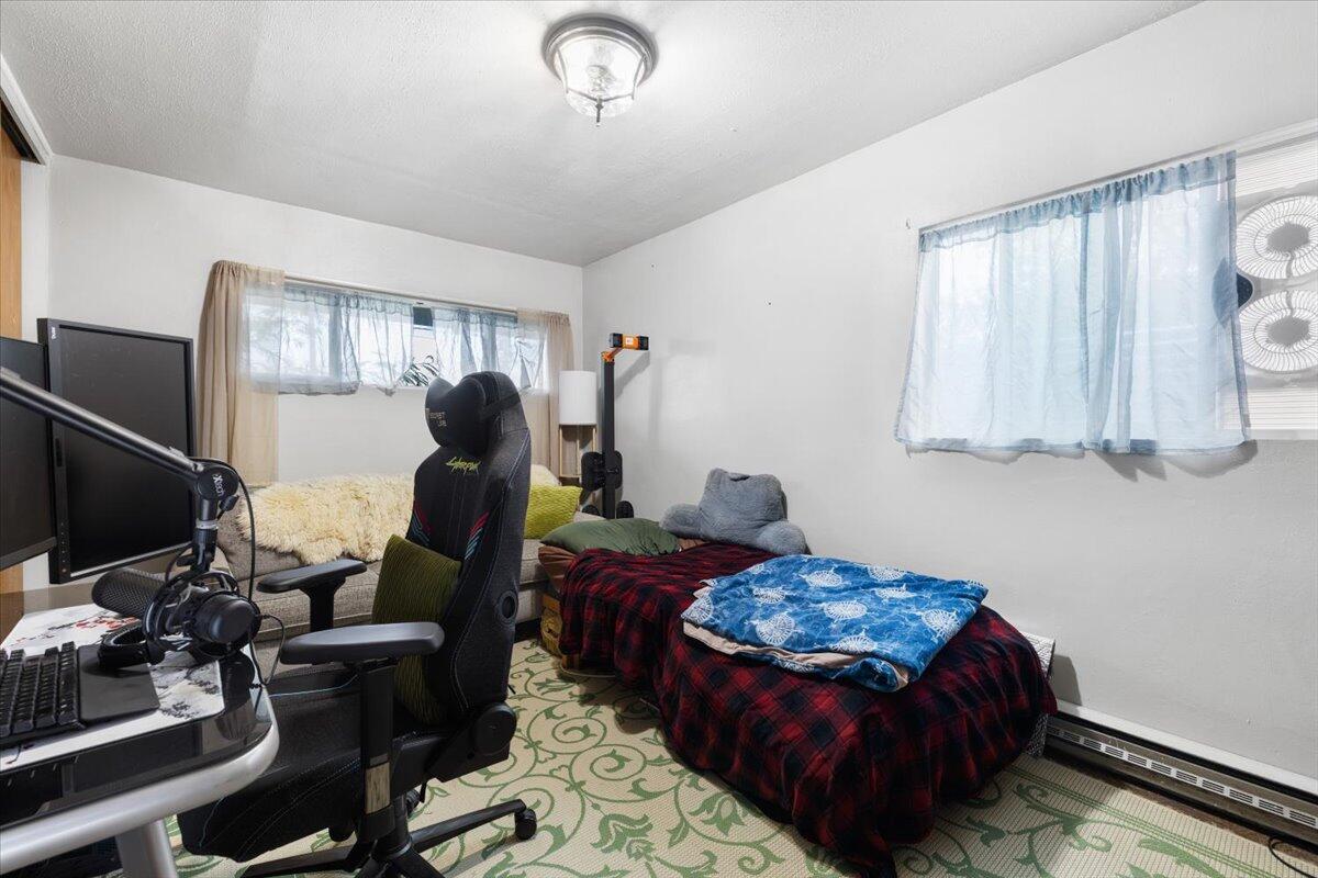 229 Gibbon Road Central Point, OR 97502 - Photo 19 of 25 a living room with furniture and a flat screen tv