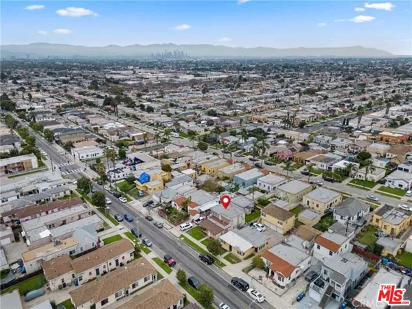 an aerial view of a city with lots of residential buildings