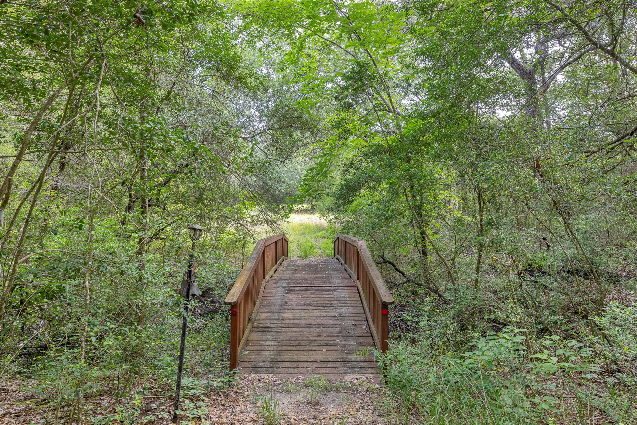 10900 Mayer Cemetery Road Burton, TX 77835 - Photo 6 of 24 a view of a house with a yard