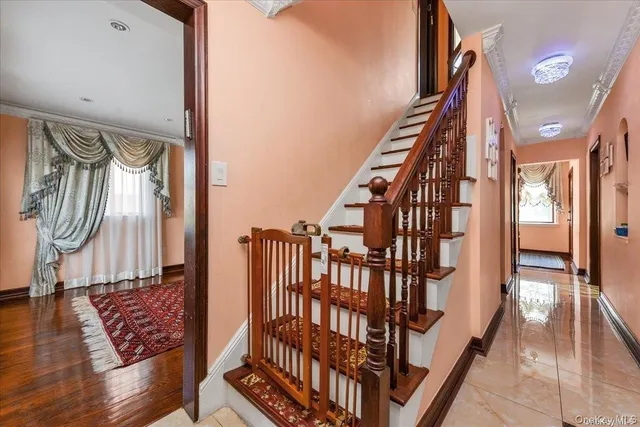 a view of entryway with wooden floor