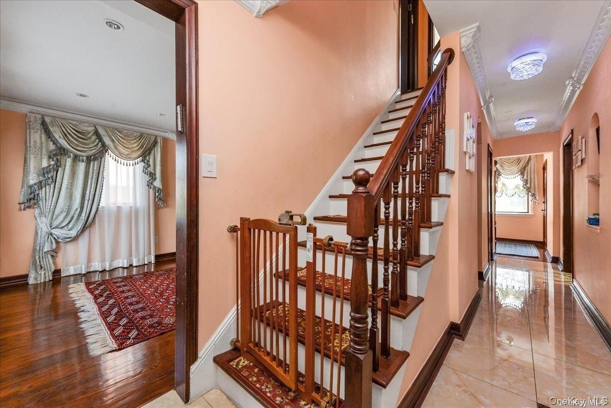 87-67 Chevy Chase Street Queens, NY 11432 - Photo 10 of 22 a view of entryway with wooden floor