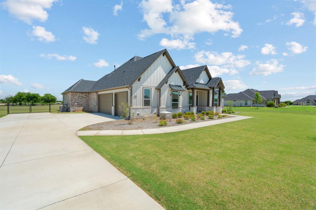 161 Frontera Drive Decatur, TX 76234 - Photo 2 of 39 Side View of Home