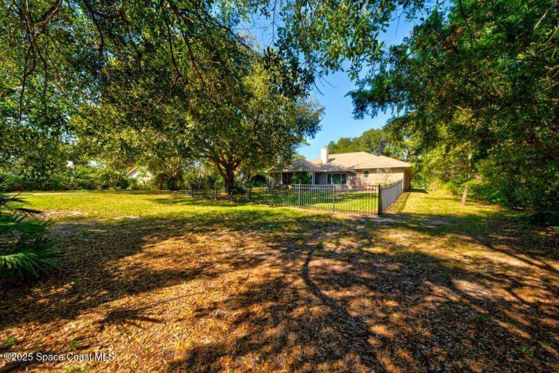 4116 Sparrow Hawk Road Melbourne, FL 32934 - Photo 41 of 70 Back Yard View 1