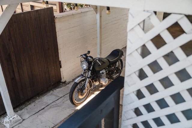 a view of a door and a window