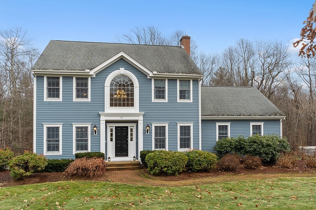 70 Bullard Road Oakham, MA 01068 - Photo 2 of 4 a front view of a house with garden