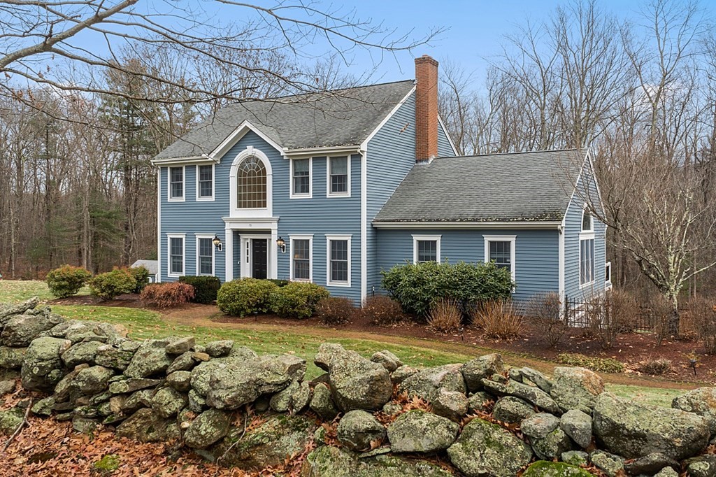 70 Bullard Road Oakham, MA 01068 - Photo 3 of 4 a front view of a house with garden