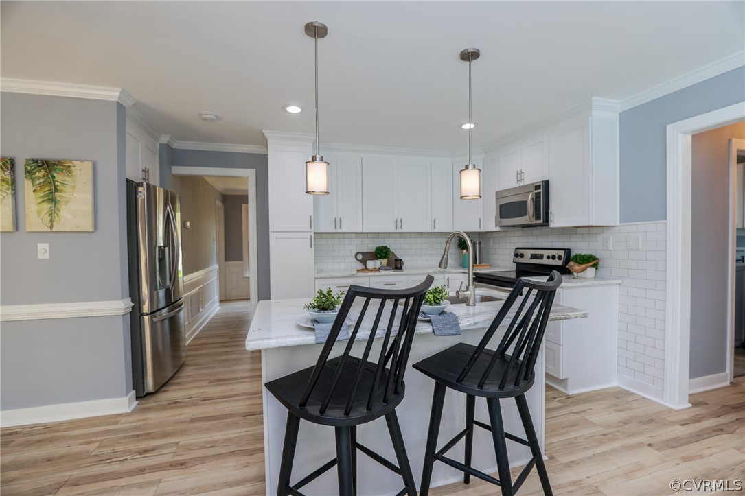 5600 North Chase Road Midlothian, VA 23112 - Photo 15 of 47 a view of a dining room with furniture and wooden floor