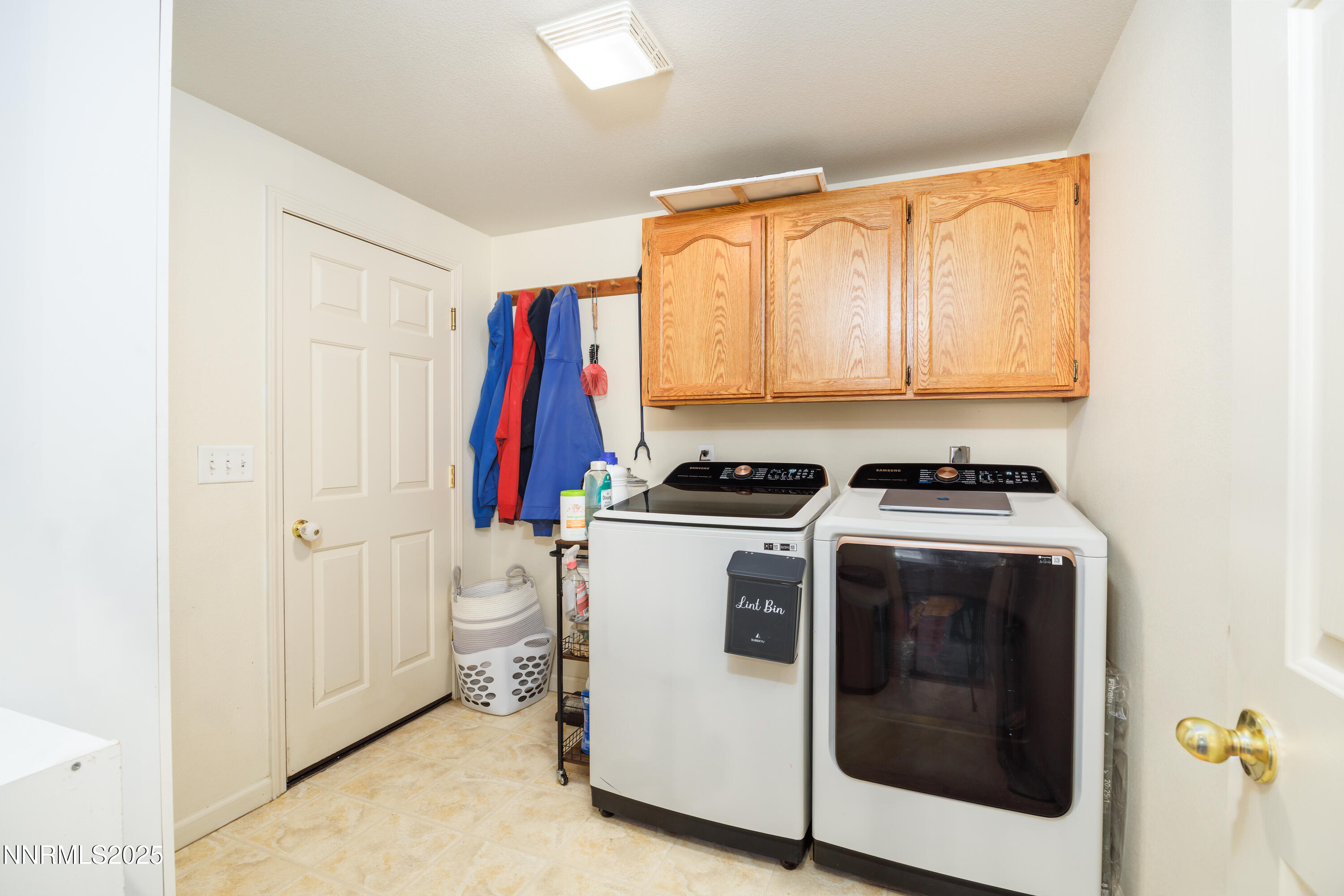 141 Country Ranch Road Fernley, NV 89408 - Photo 17 of 43 a view of a storage and utility room with washer and dryer