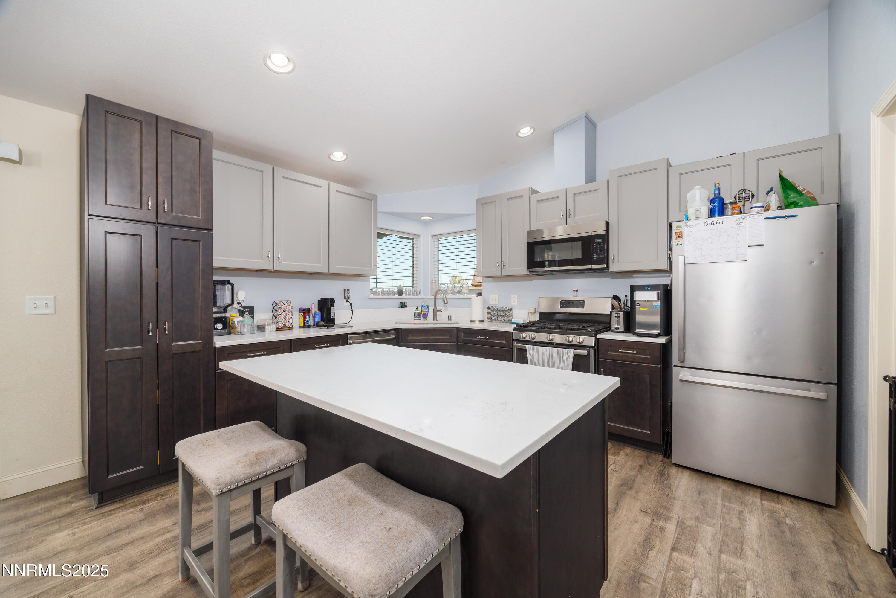 141 Country Ranch Road Fernley, NV 89408 - Photo 18 of 43 a kitchen with a refrigerator a stove a sink and a refrigerator