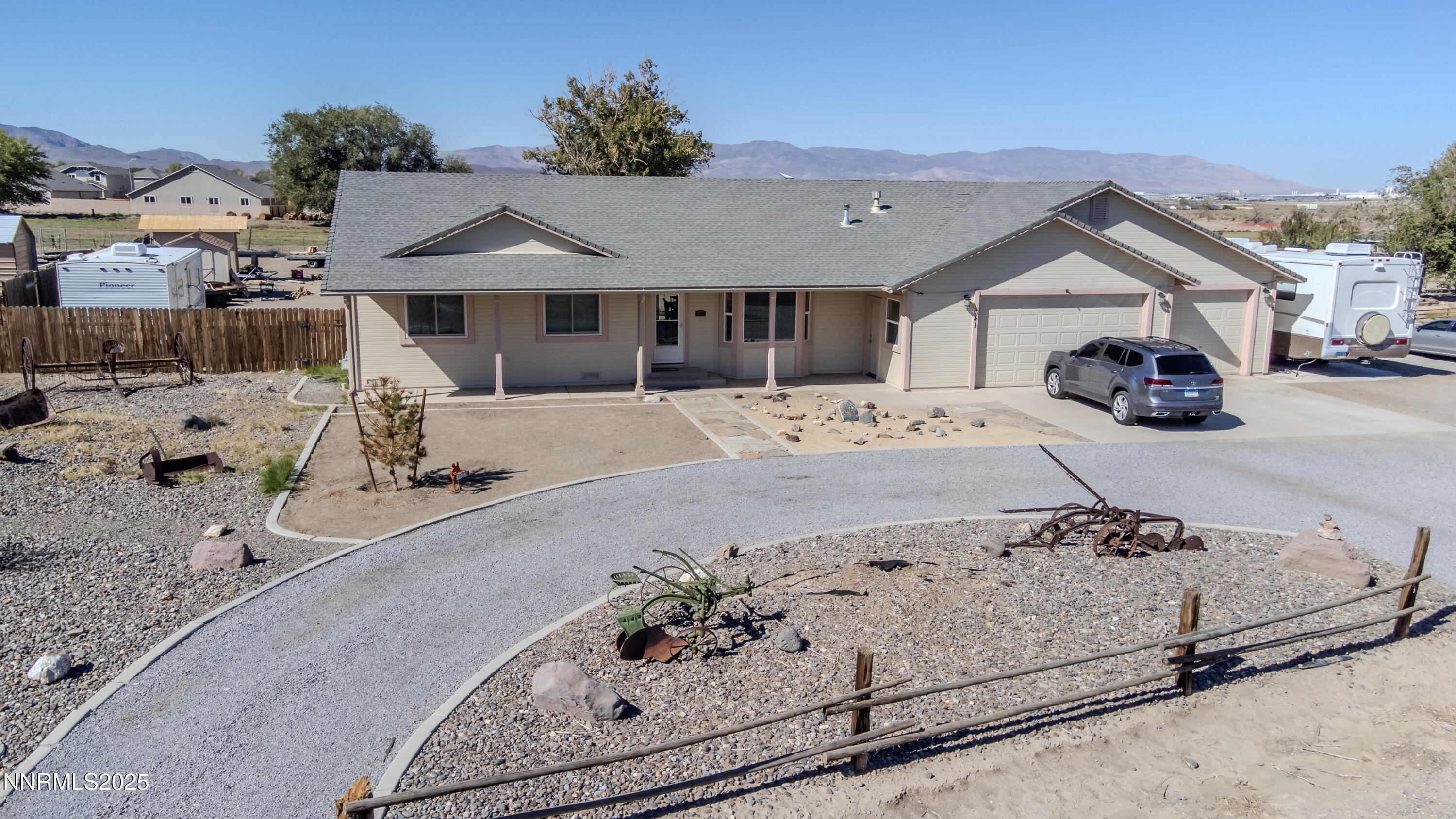 141 Country Ranch Road Fernley, NV 89408 - Photo 2 of 43 a view of a house with a outdoor space