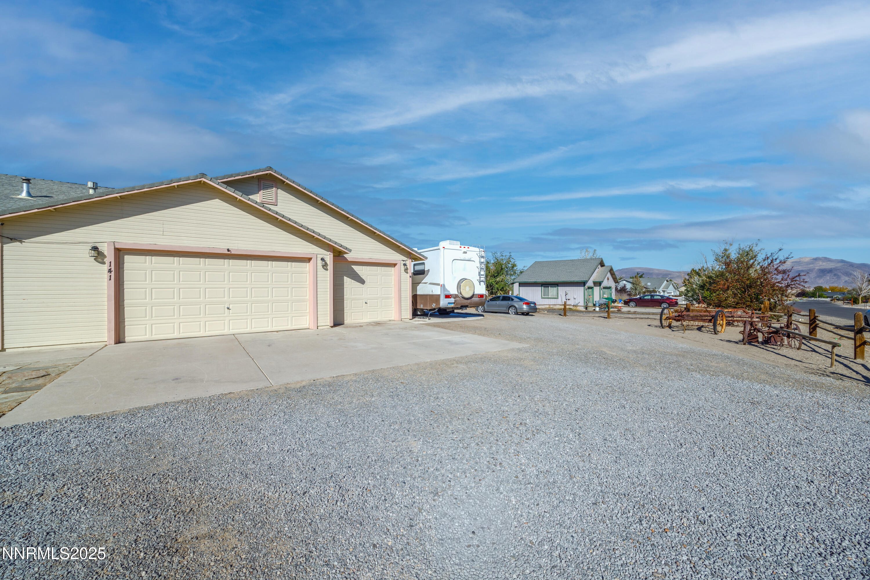 141 Country Ranch Road Fernley, NV 89408 - Photo 21 of 43 a view of garage and yard
