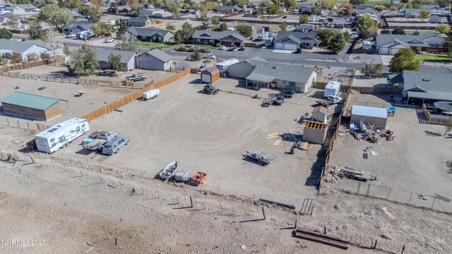 an aerial view of a house with outdoor space