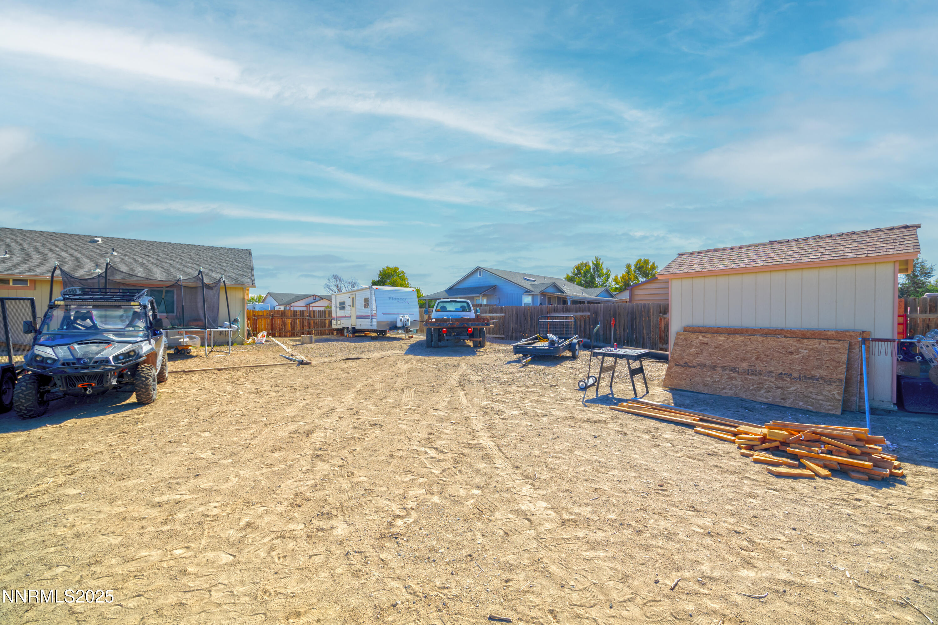 141 Country Ranch Road Fernley, NV 89408 - Photo 31 of 44 a living room with furniture and a fireplace