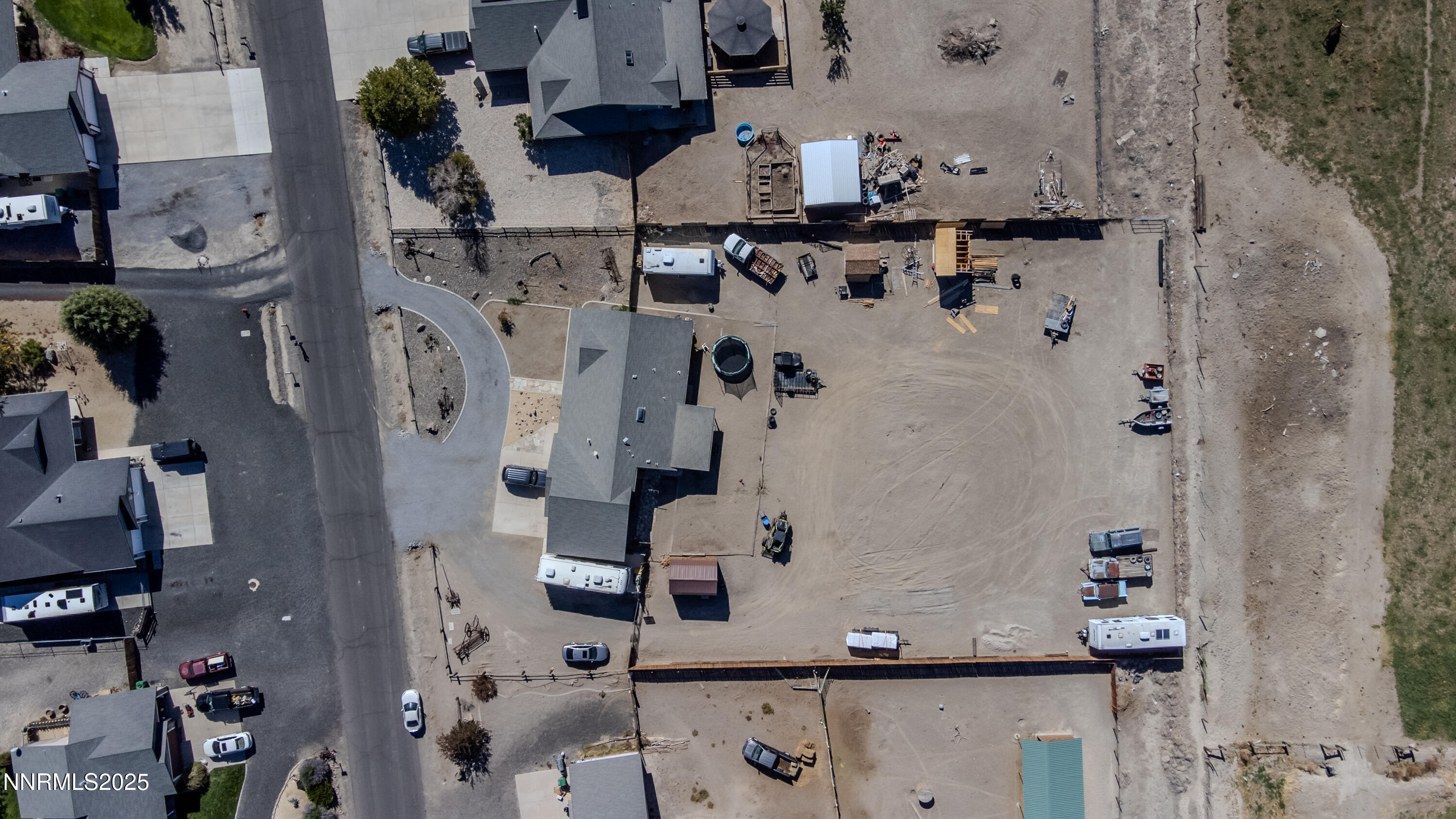 141 Country Ranch Road Fernley, NV 89408 - Photo 36 of 43 an aerial view of residential house with parking