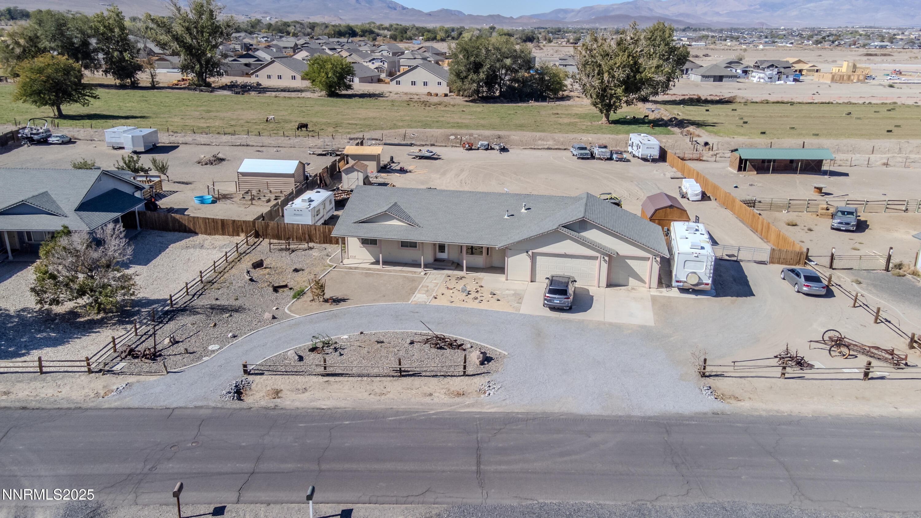 141 Country Ranch Road Fernley, NV 89408 - Photo 7 of 43 an aerial view of a house with outdoor space