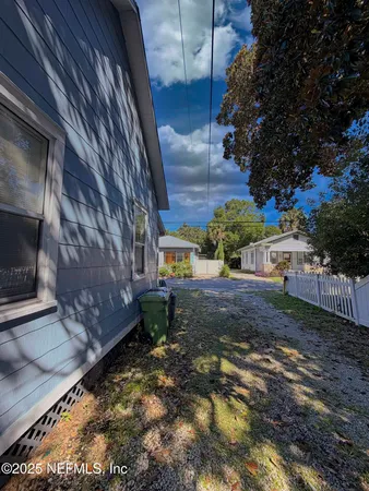 a view of a yard with patio