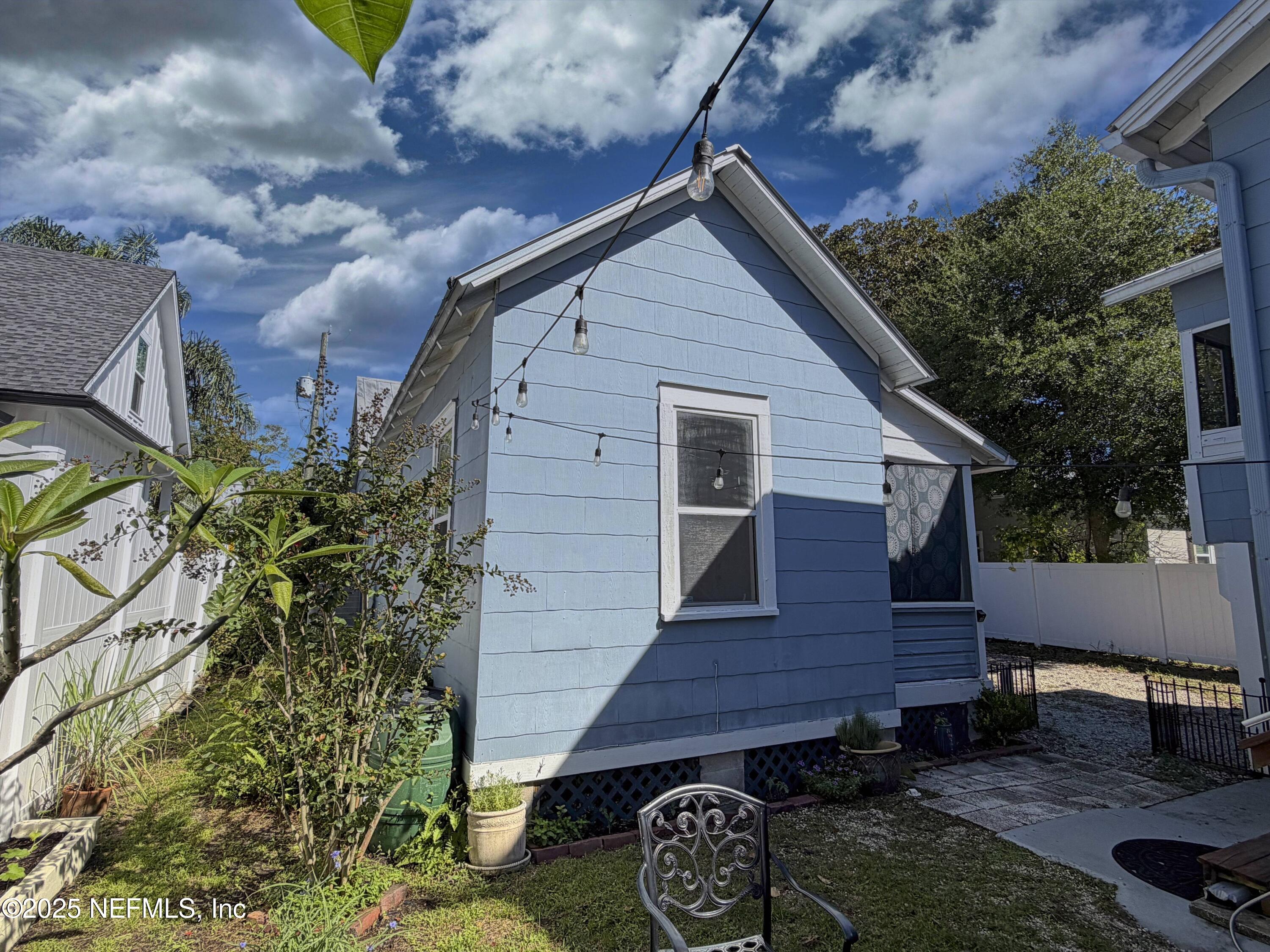 15 Hope Street St. Augustine, FL 32084 - Photo 14 of 16 a view of a small house and a yard
