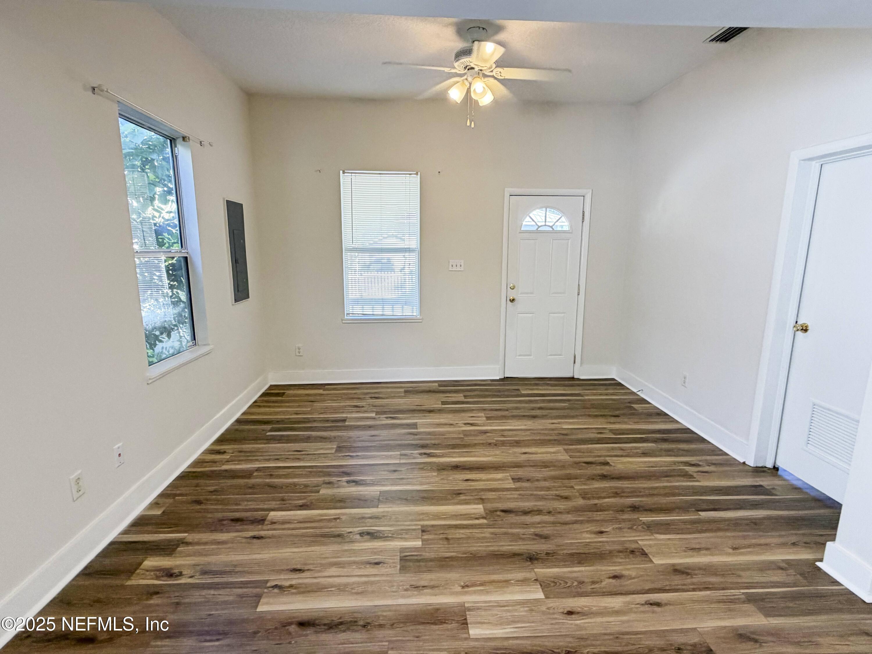 15 Hope Street St. Augustine, FL 32084 - Photo 3 of 16 a view of empty room with window and ceiling fan