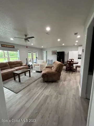 a living room with furniture and a couch