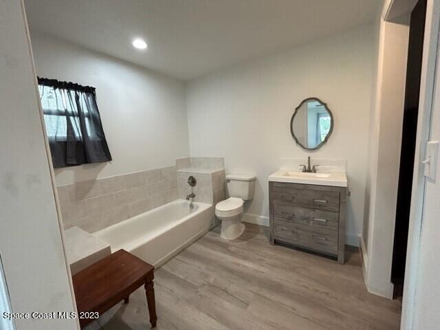 520 Atz Road, Unit COTTAGE Malabar, FL 32950 - Photo 23 of 25 a bathroom with a toilet a sink and a bathtub