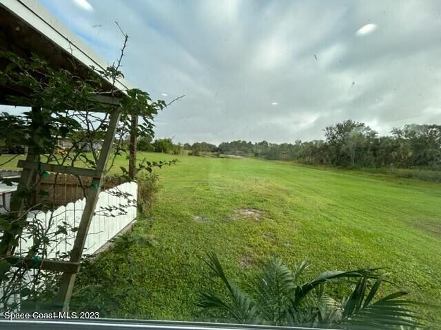 520 Atz Road, Unit COTTAGE Malabar, FL 32950 - Photo 5 of 25 a view of an ocean from a balcony