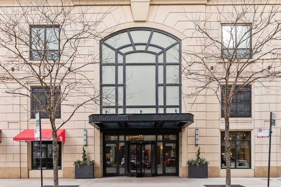 10 East Delaware Place, Unit 21D Chicago, IL 60611 - Photo 1 of 33 a building with a sign on it