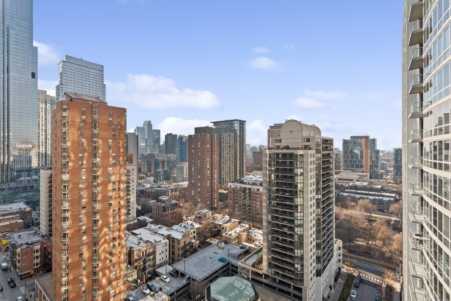 10 East Delaware Place, Unit 21D Chicago, IL 60611 - Photo 28 of 33 a view of a city with tall buildings