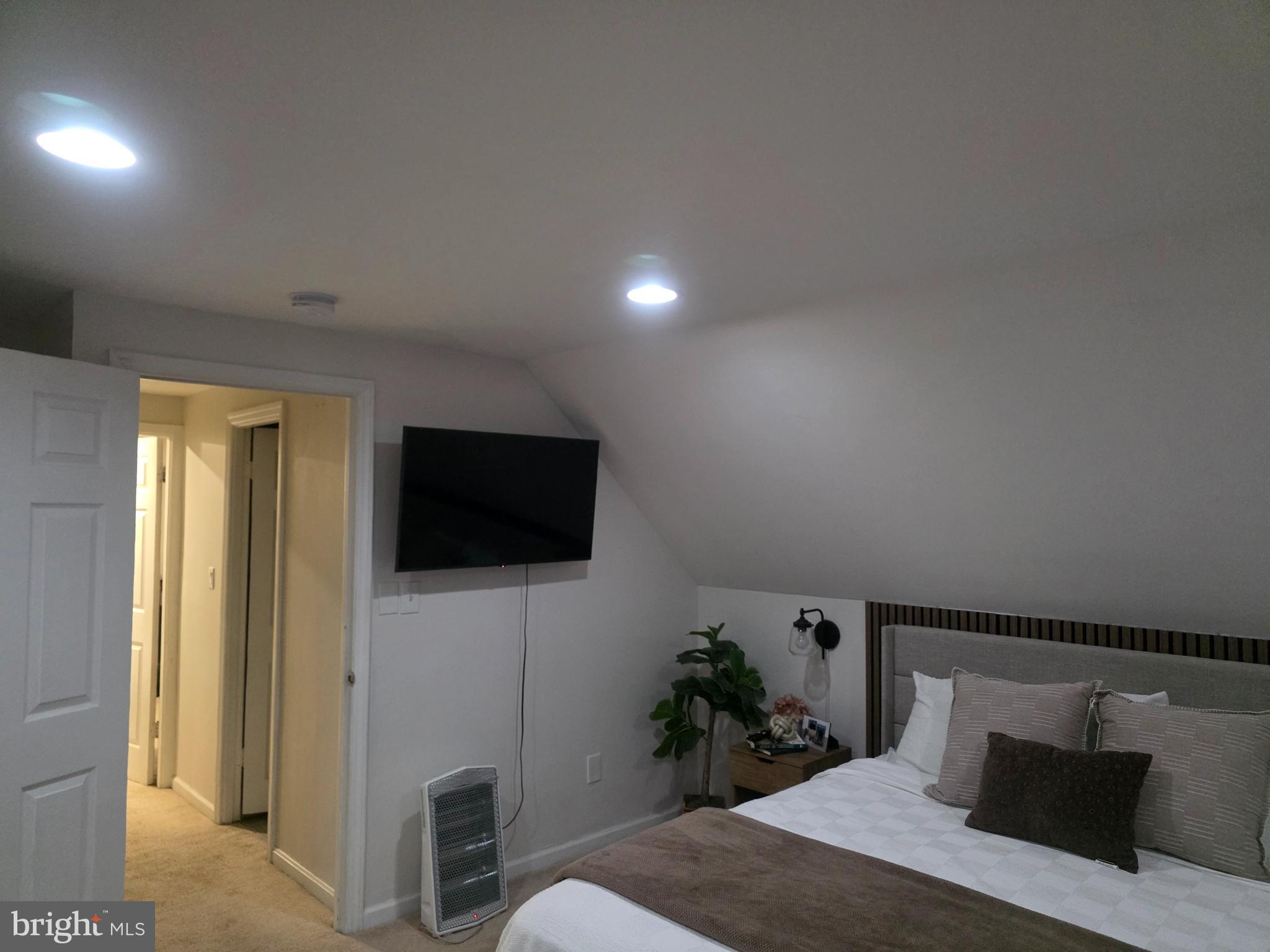 44 Peacock Lane Willingboro, NJ 08046 - Photo 17 of 23 a bedroom with a bed and a flat screen tv