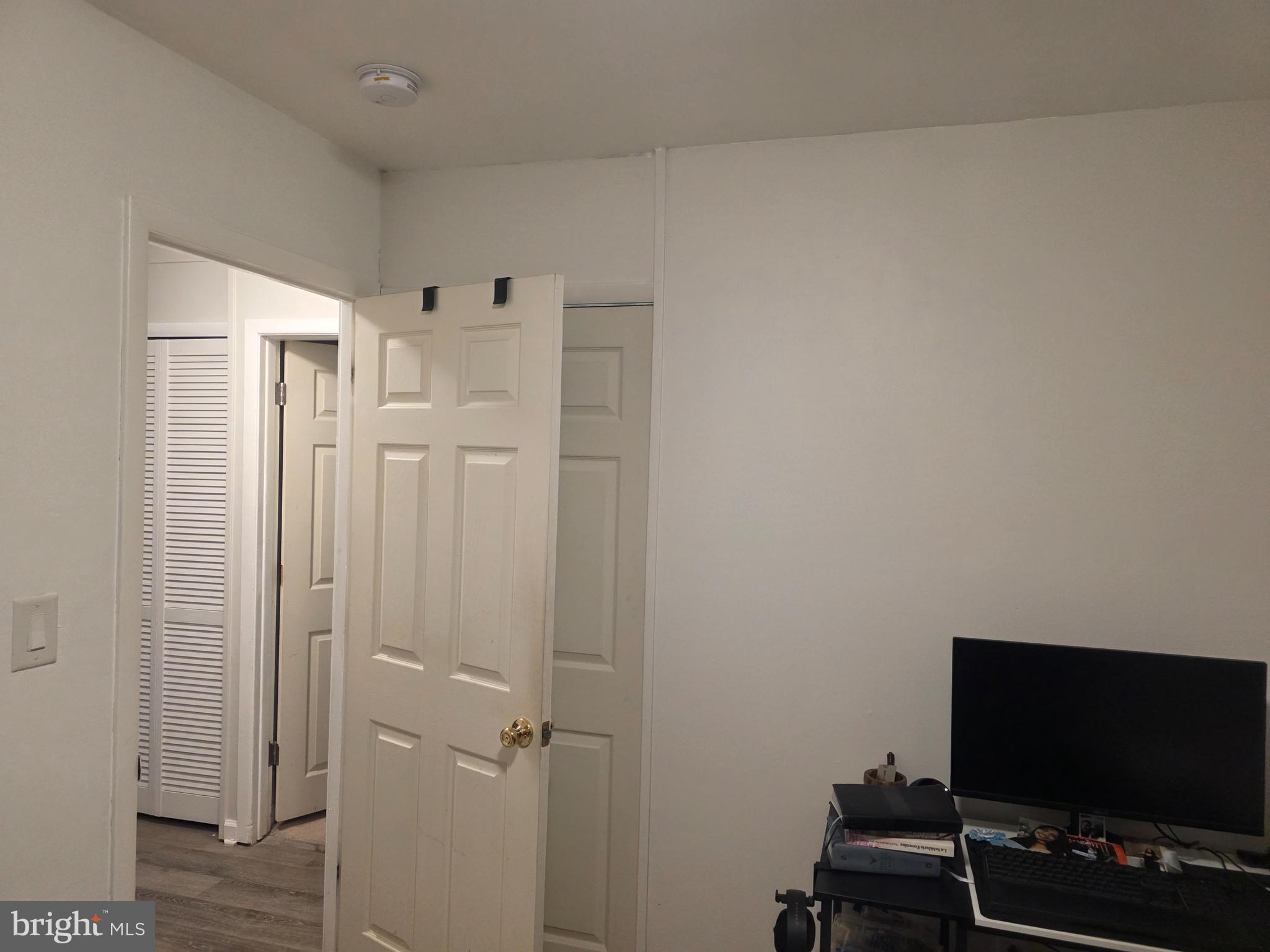 44 Peacock Lane Willingboro, NJ 08046 - Photo 9 of 23 a view of a livingroom with furniture and a flat screen tv