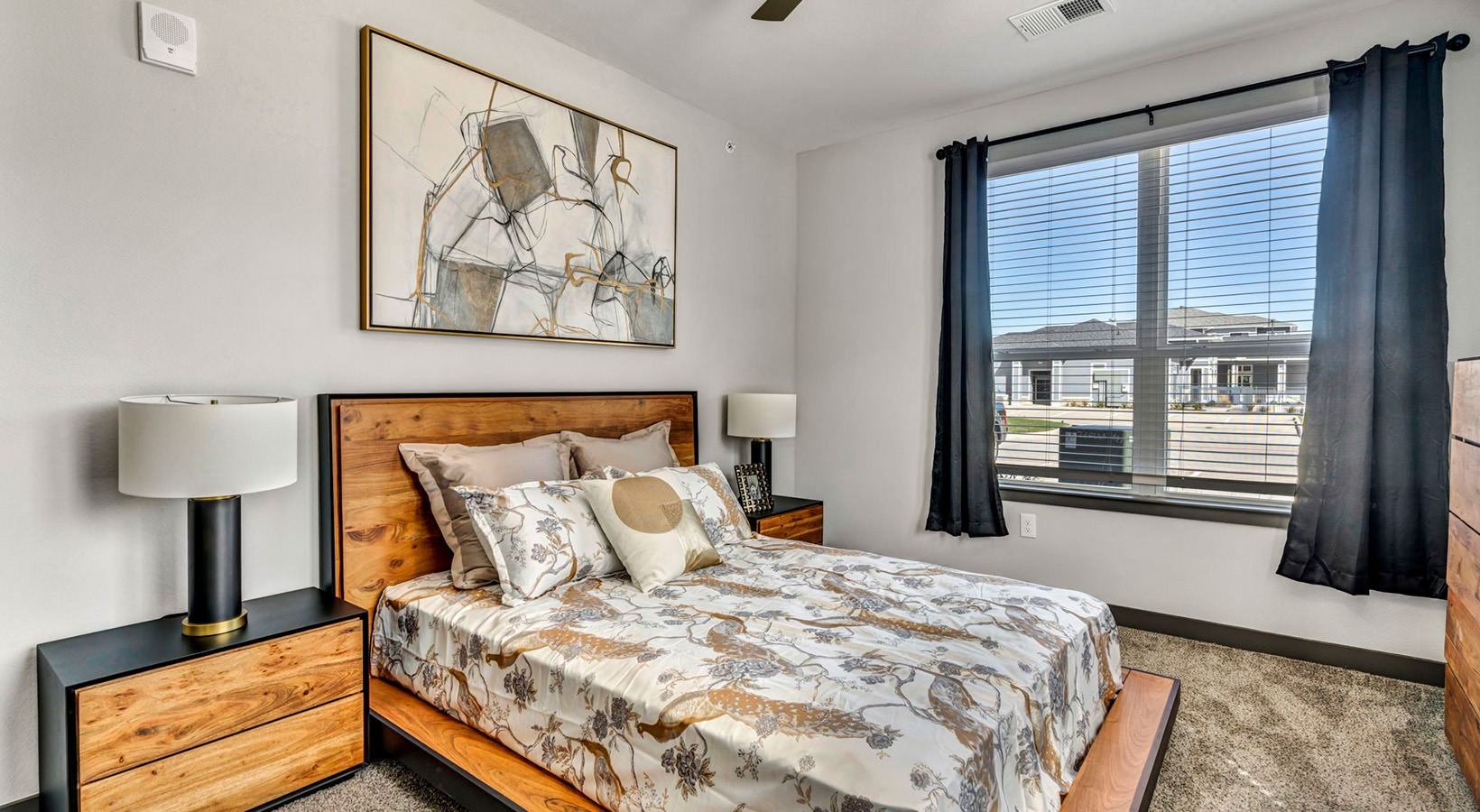 8811 Fm Road, Unit 1203 Richmond, TX 77407 - Photo 6 of 11 a bedroom with a bed and a window