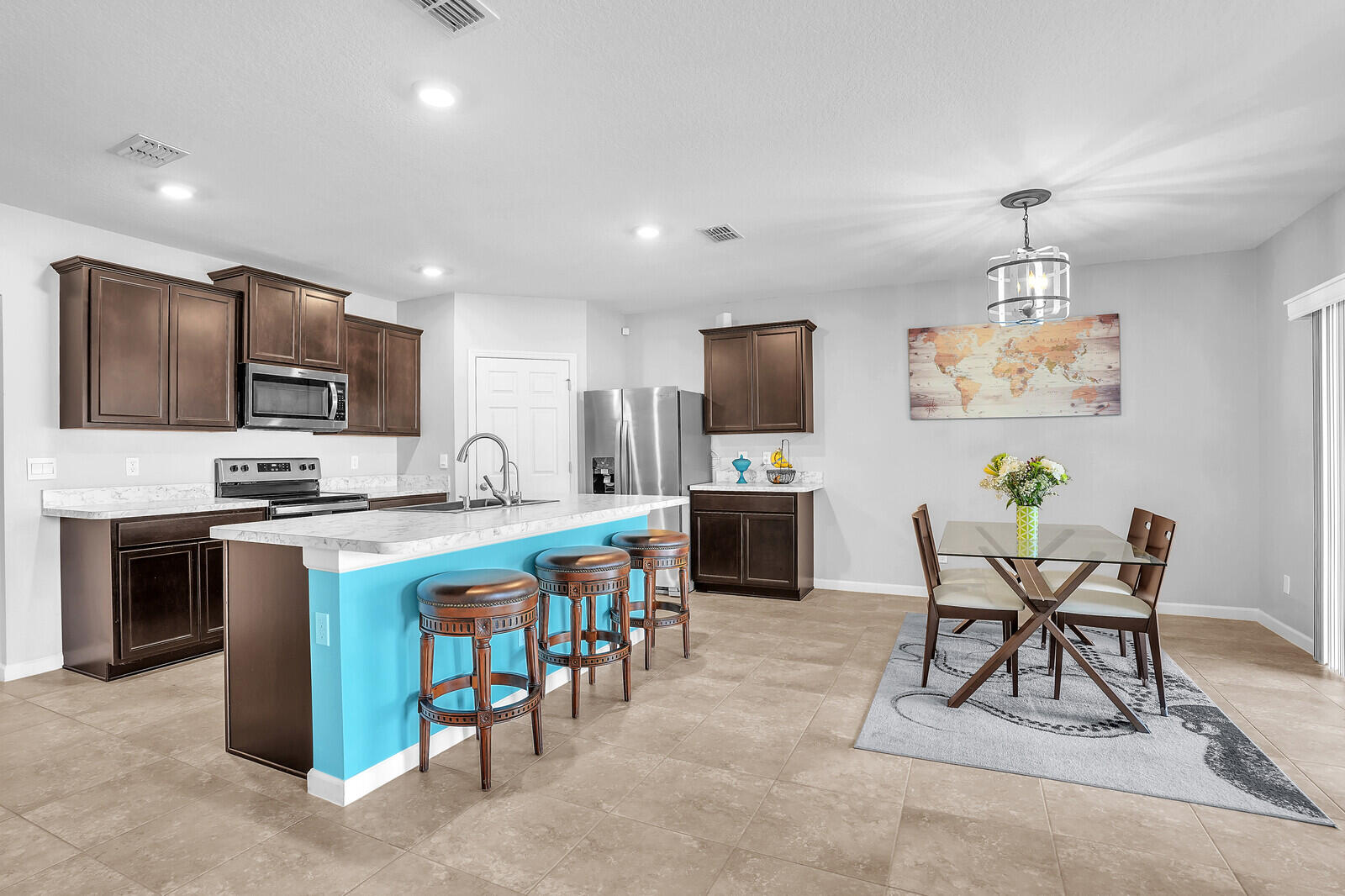 1401 Southeast Portillo Road Port St. Lucie, FL 34952 - Photo 14 of 41 Kitchen and dining