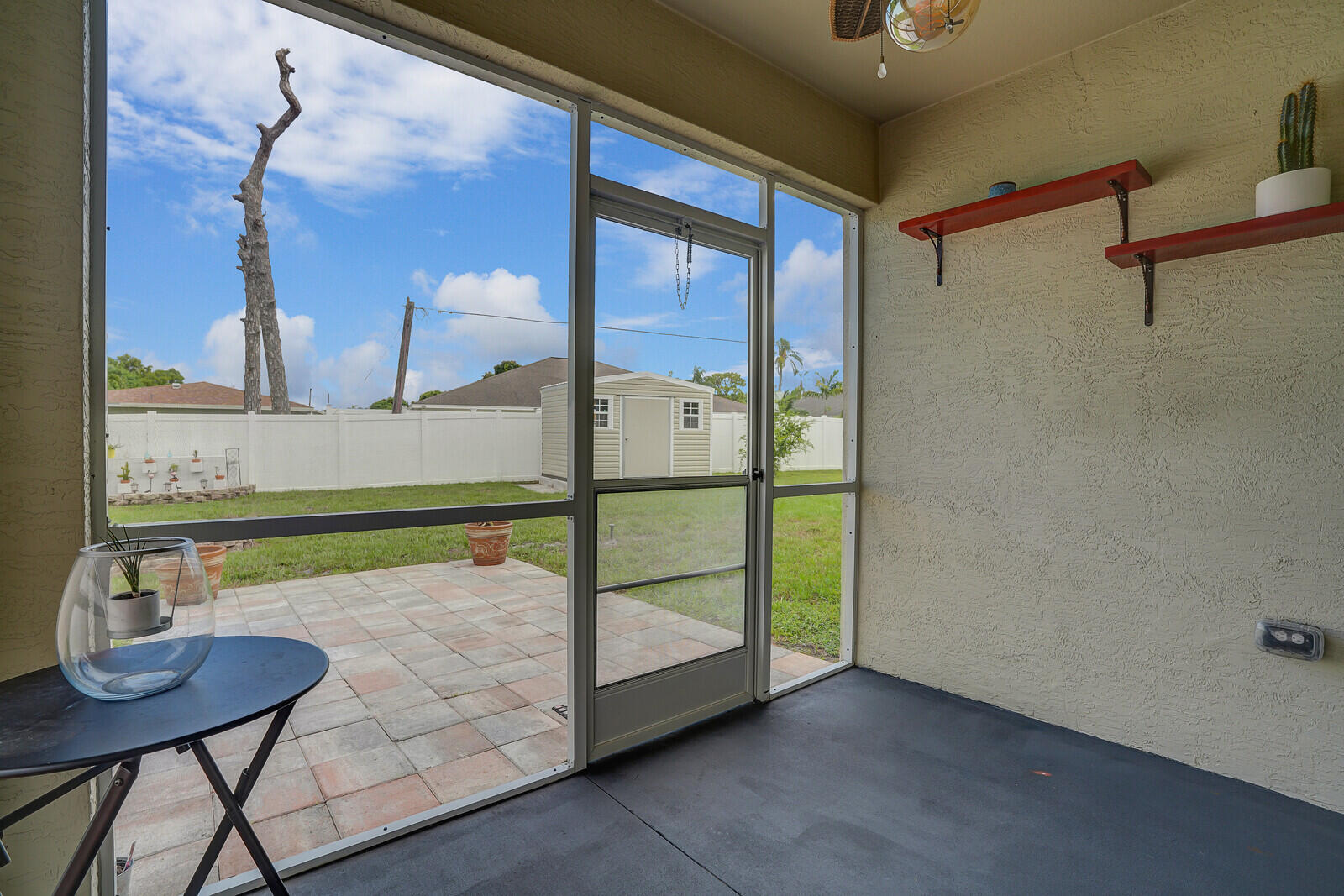 1401 Southeast Portillo Road Port St. Lucie, FL 34952 - Photo 36 of 41 Screened porch