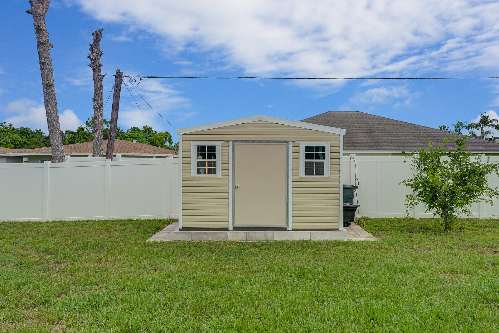 1401 Southeast Portillo Road Port St. Lucie, FL 34952 - Photo 41 of 41 Convenient storage shed on pad