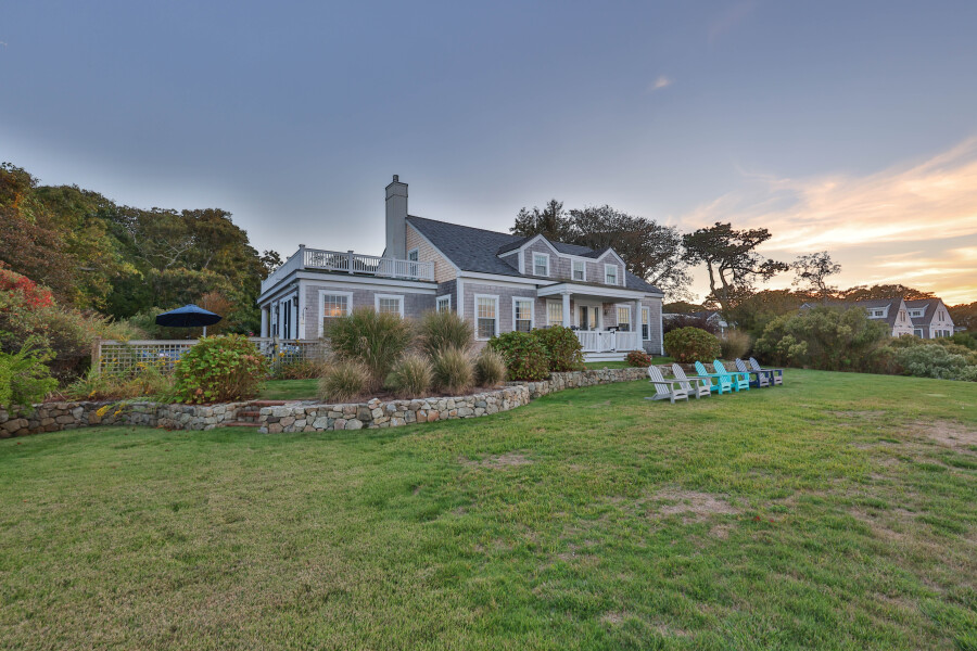 9 Fowler Avenue Edgartown, MA 02539 - Photo 23 of 27 a front view of a house with a yard