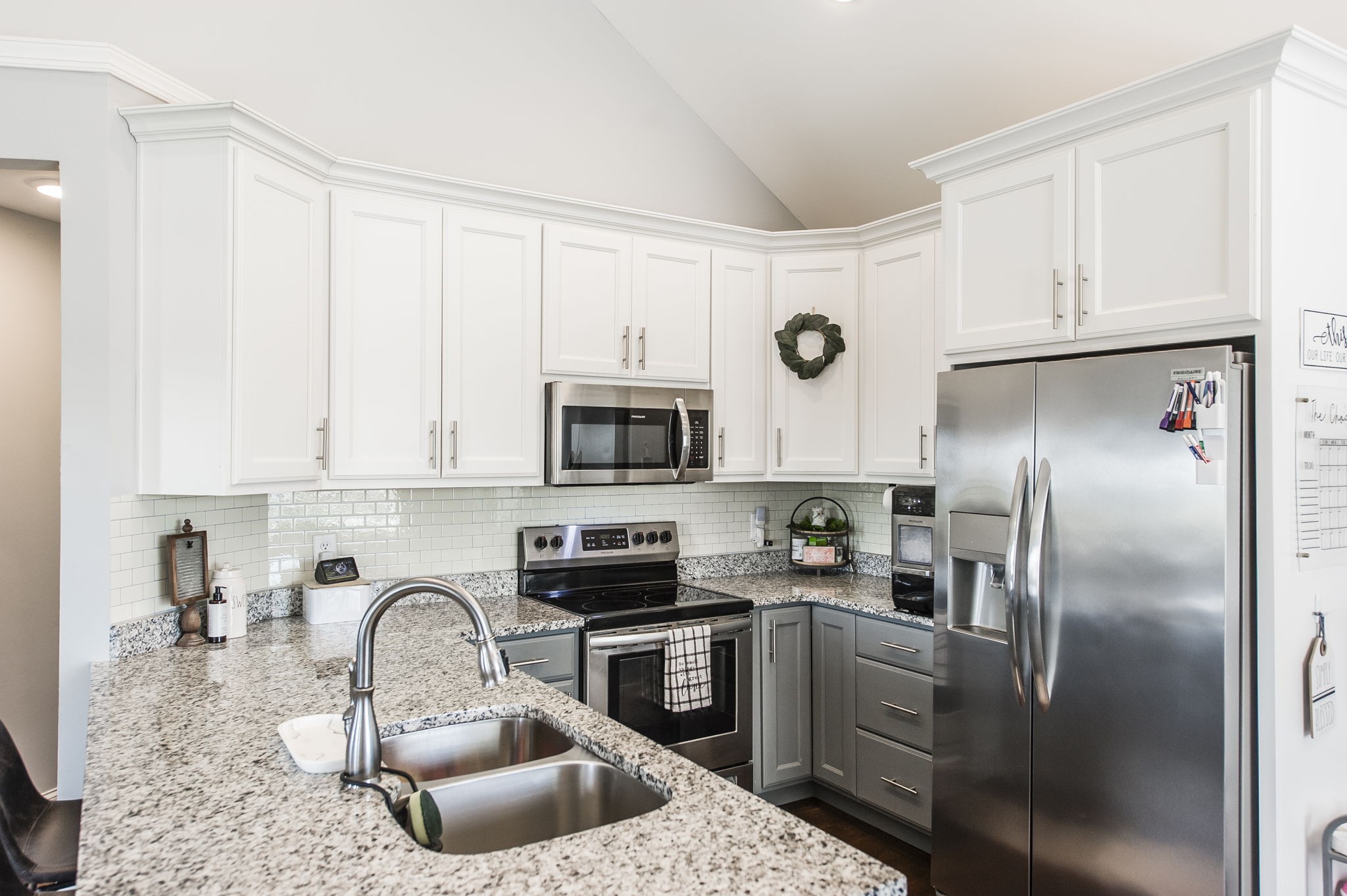 1261 Friendship Road Cross Plains, TN 37049 - Photo 13 of 47 a kitchen with stainless steel appliances granite countertop a sink a refrigerator a stove a microwave and cabinets