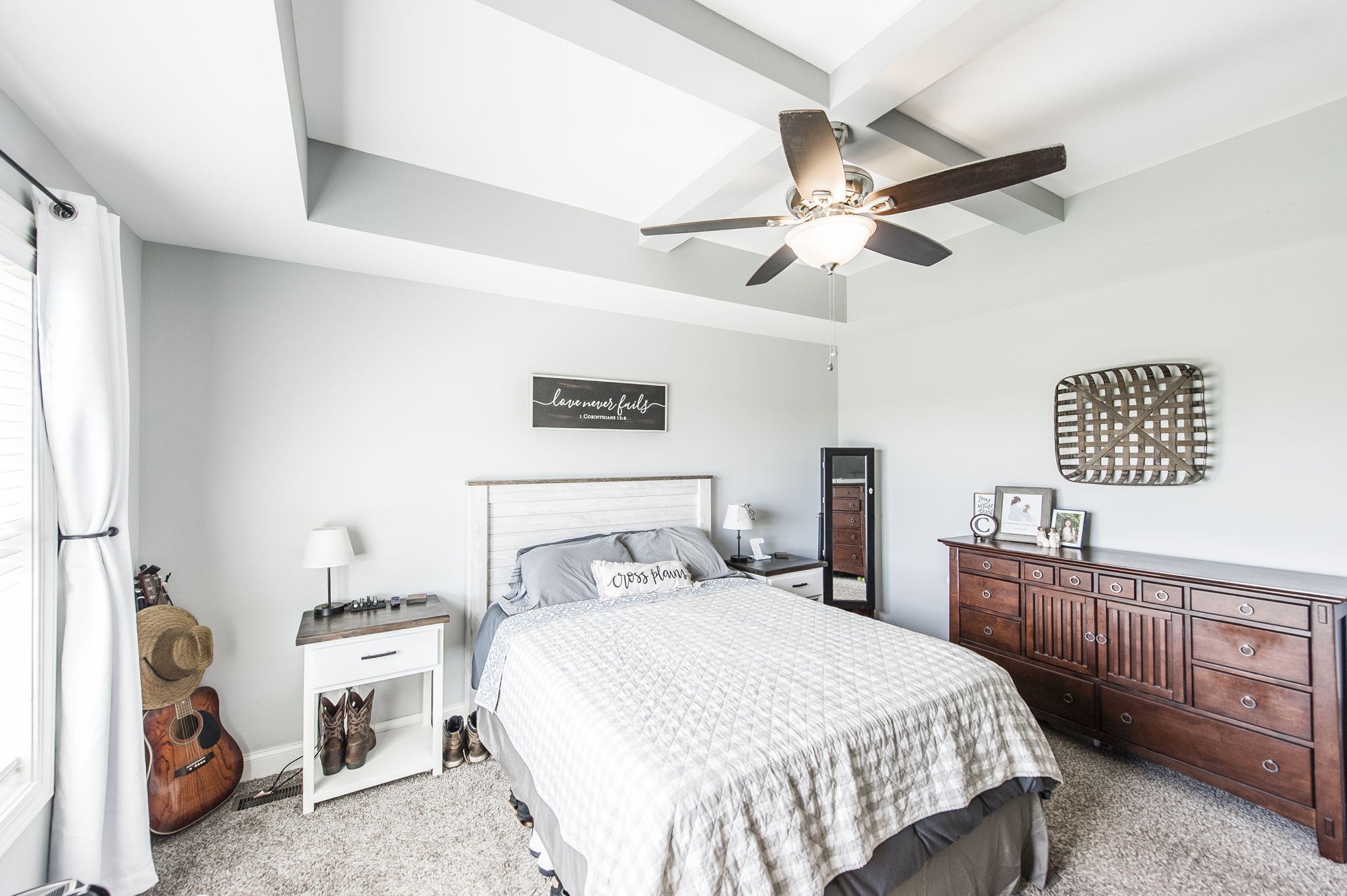 1261 Friendship Road Cross Plains, TN 37049 - Photo 21 of 47 a bedroom with a bed and a chandelier