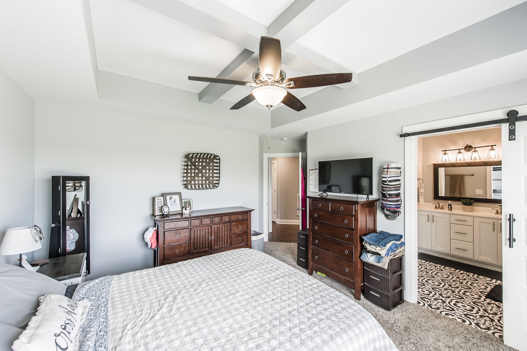 1261 Friendship Road Cross Plains, TN 37049 - Photo 22 of 47 a bedroom with a bed and a flat screen tv