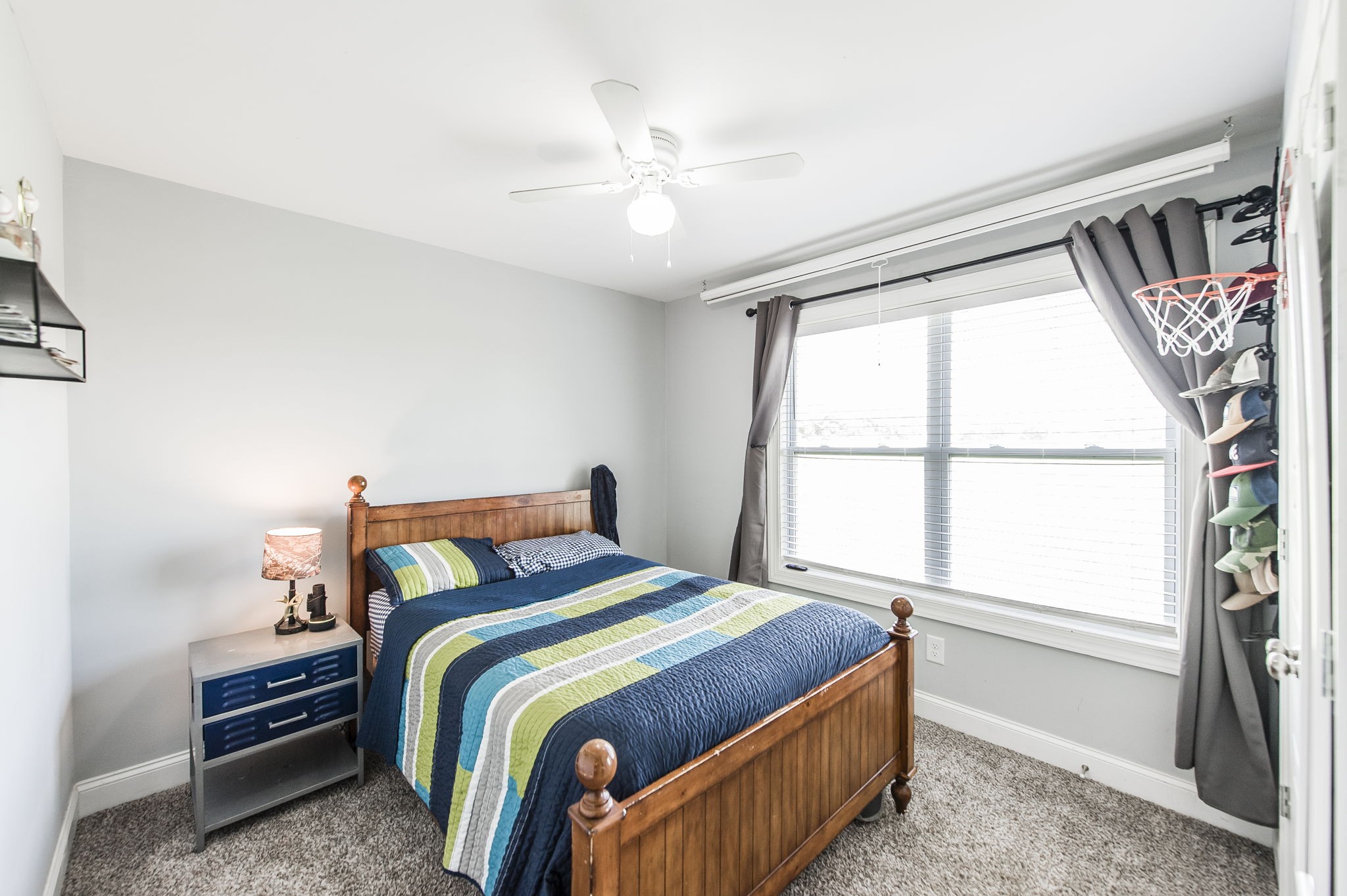 1261 Friendship Road Cross Plains, TN 37049 - Photo 25 of 47 a bedroom with a bed and a large window with the outer view