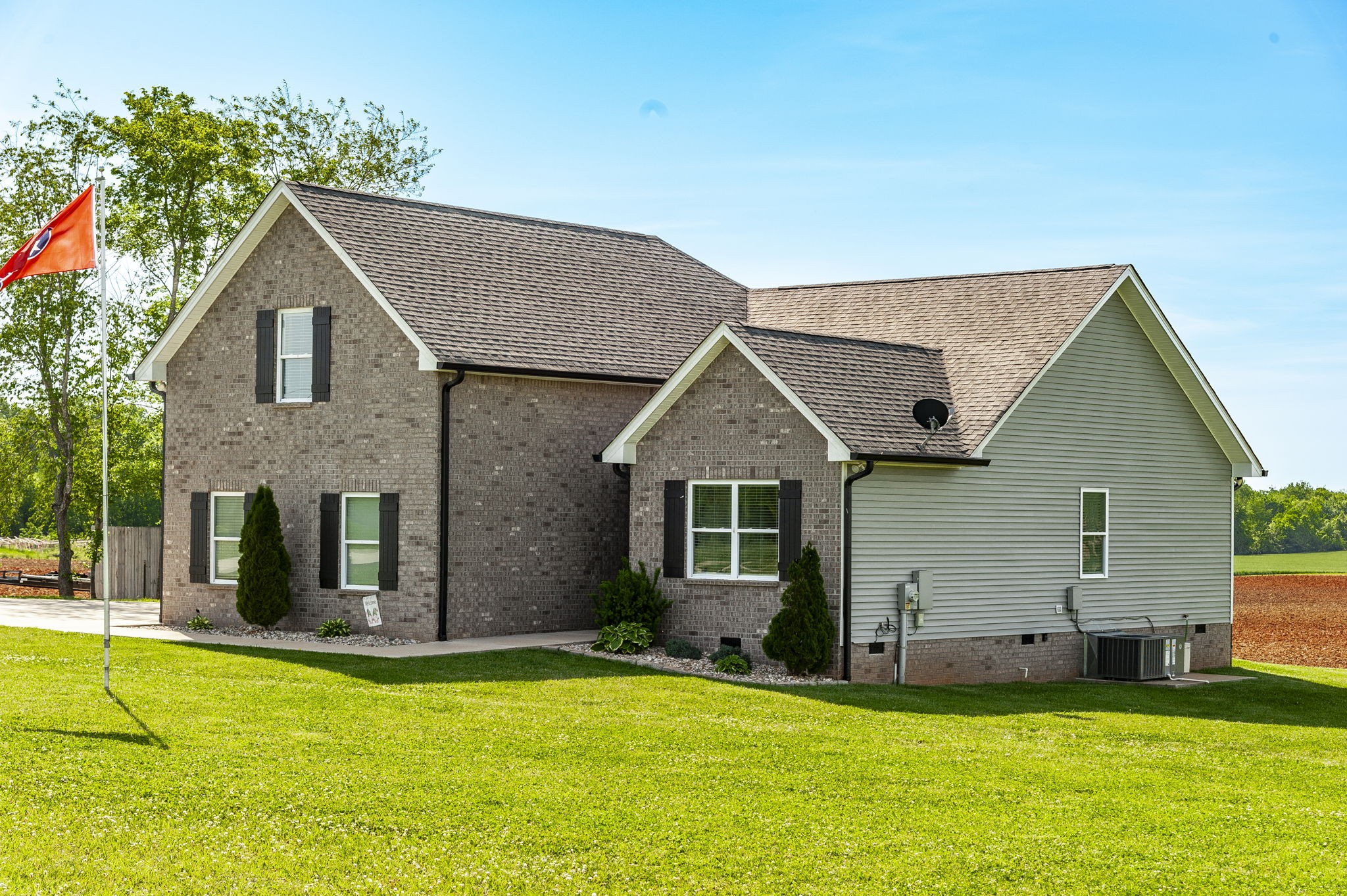 1261 Friendship Road Cross Plains, TN 37049 - Photo 3 of 47 a view of a house with a yard