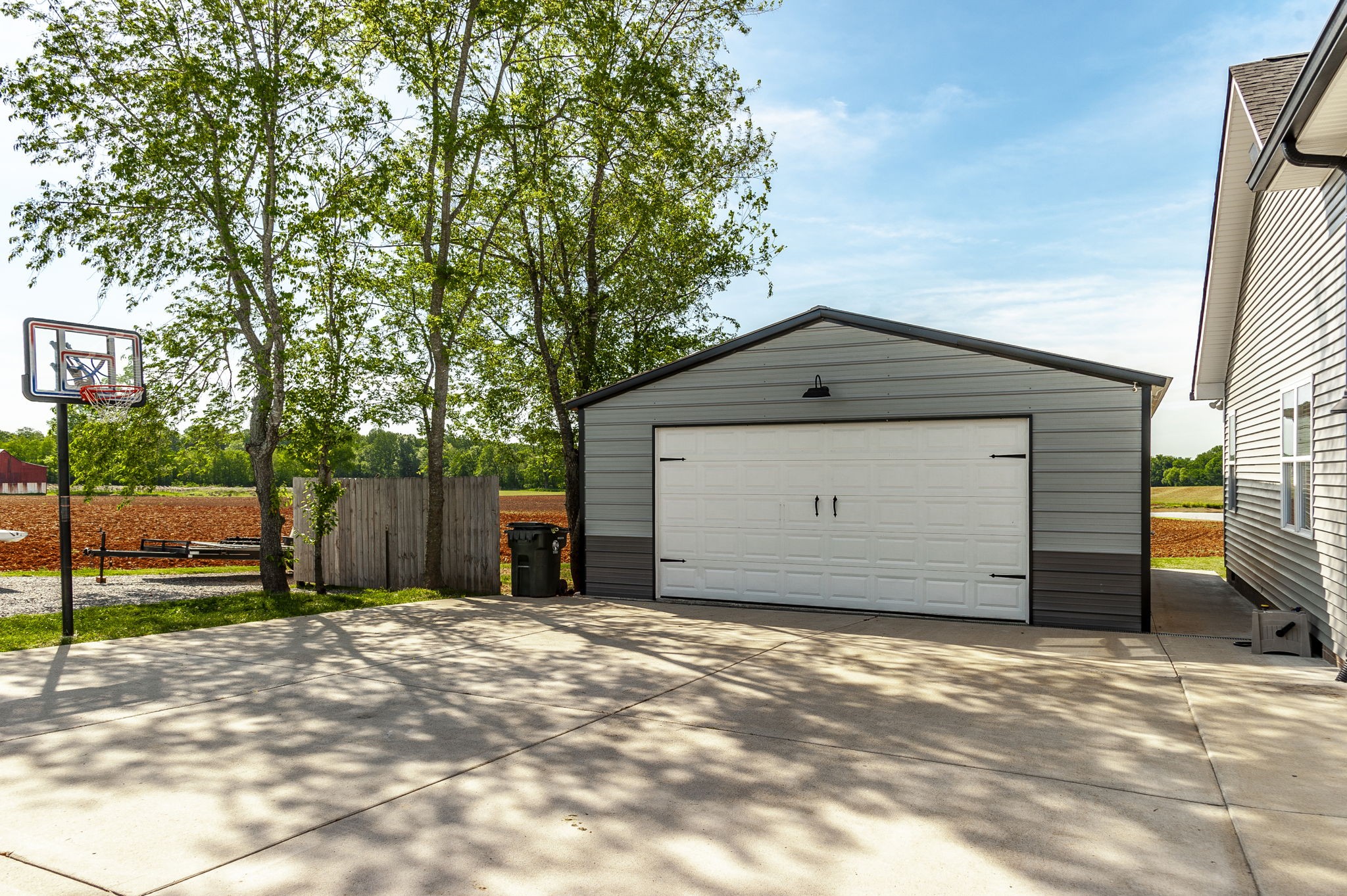 1261 Friendship Road Cross Plains, TN 37049 - Photo 32 of 47 a front view of a house with a garage