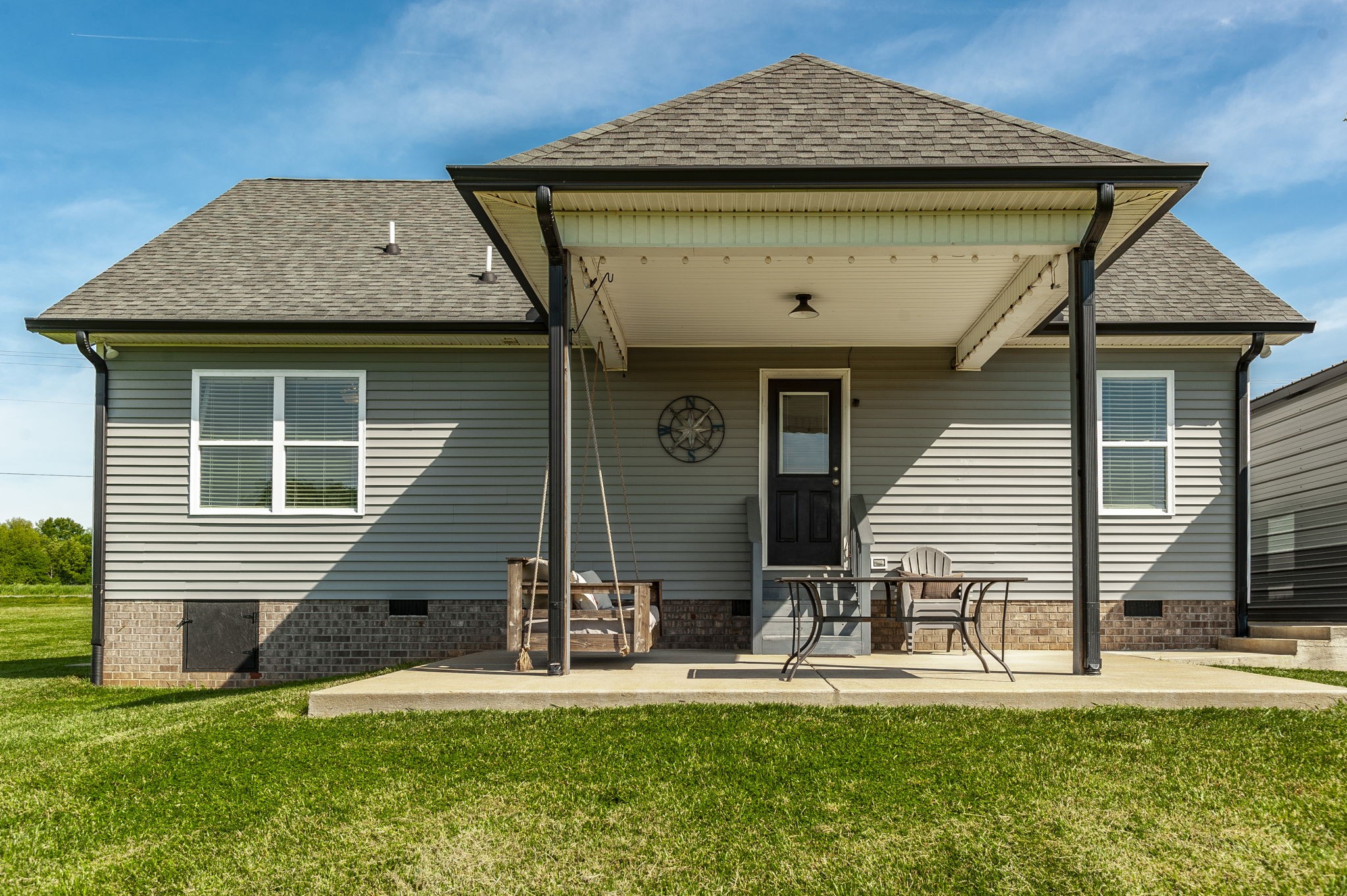 1261 Friendship Road Cross Plains, TN 37049 - Photo 40 of 47 a front view of a house with a yard