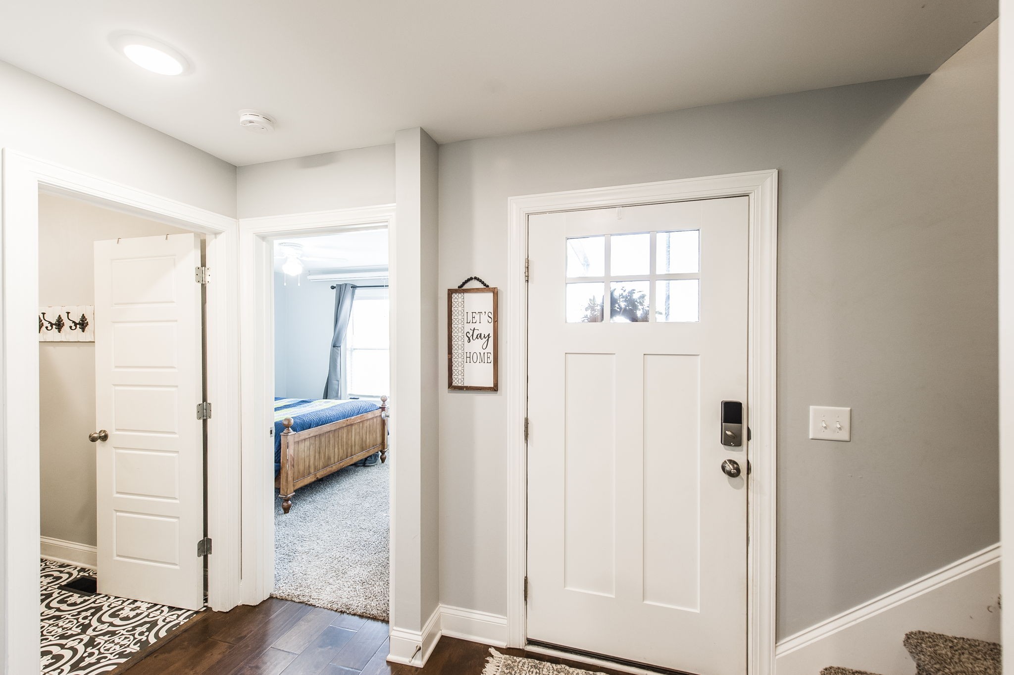 1261 Friendship Road Cross Plains, TN 37049 - Photo 8 of 47 a view of a bedroom with bed and wooden floor