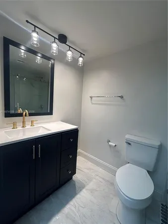 a living room with furniture a table and a flat screen tv