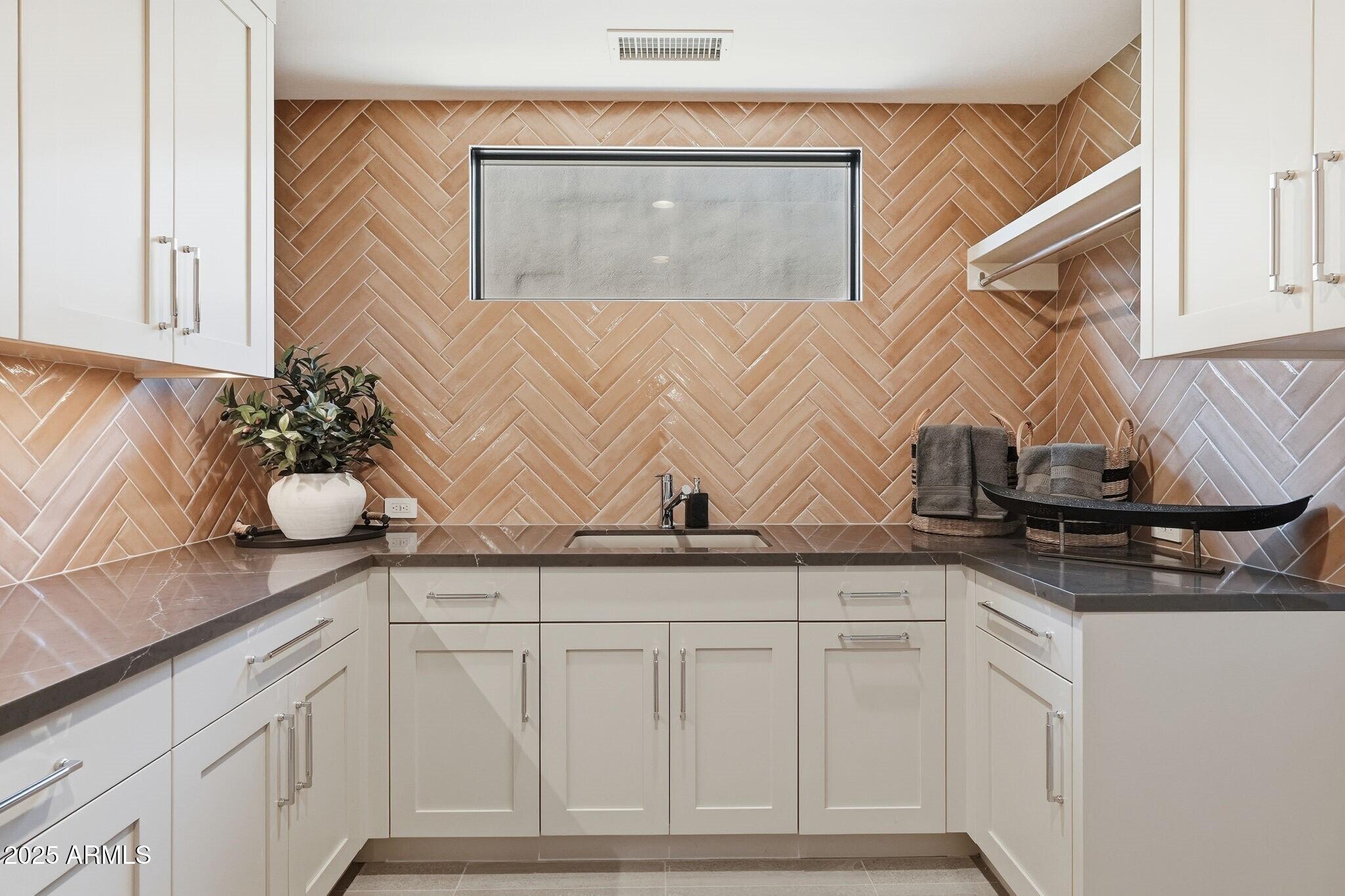 37200 North Cave Creek Road, Unit 1018 Scottsdale, AZ 85262 - Photo 28 of 54 028_Laundry Room