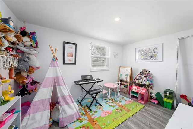 a bed room with furniture and a couch