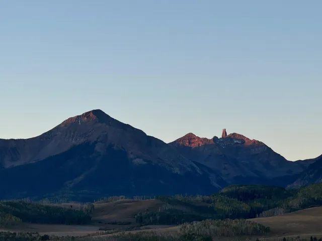 a view of a large mountain with a mountain