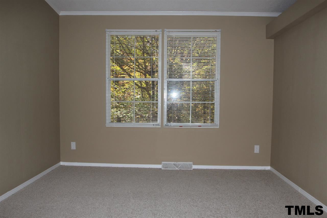 265 Heritage Road Roxboro, NC 27574 - Photo 3 of 13 Dining room with new carpet and paint