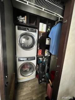 121 Haskin Street Boon, MI 49618 - Photo 13 of 13 Laundry area featuring stacked washing machine and dryer