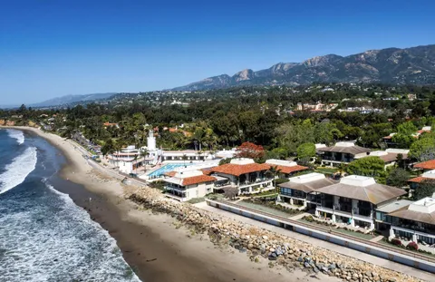 a front view of a building with street view